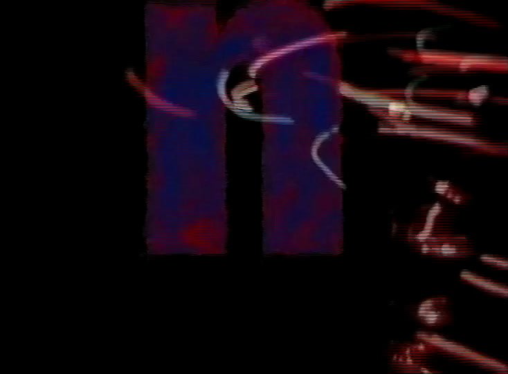 A fat magenta letter n fills the black screen, light streaks trailing behind it