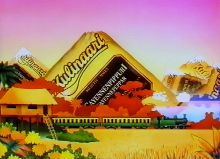 A drawn pyramid carries a banner above huts, a train and a pink sky.