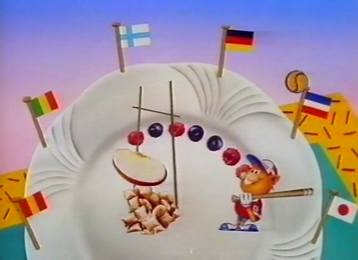 Small national flags stand in a white plate of cereal beside a drawn figure.
