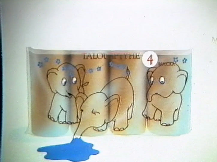 One printed elephant lowers its trunk to the blue puddle beneath the pack.