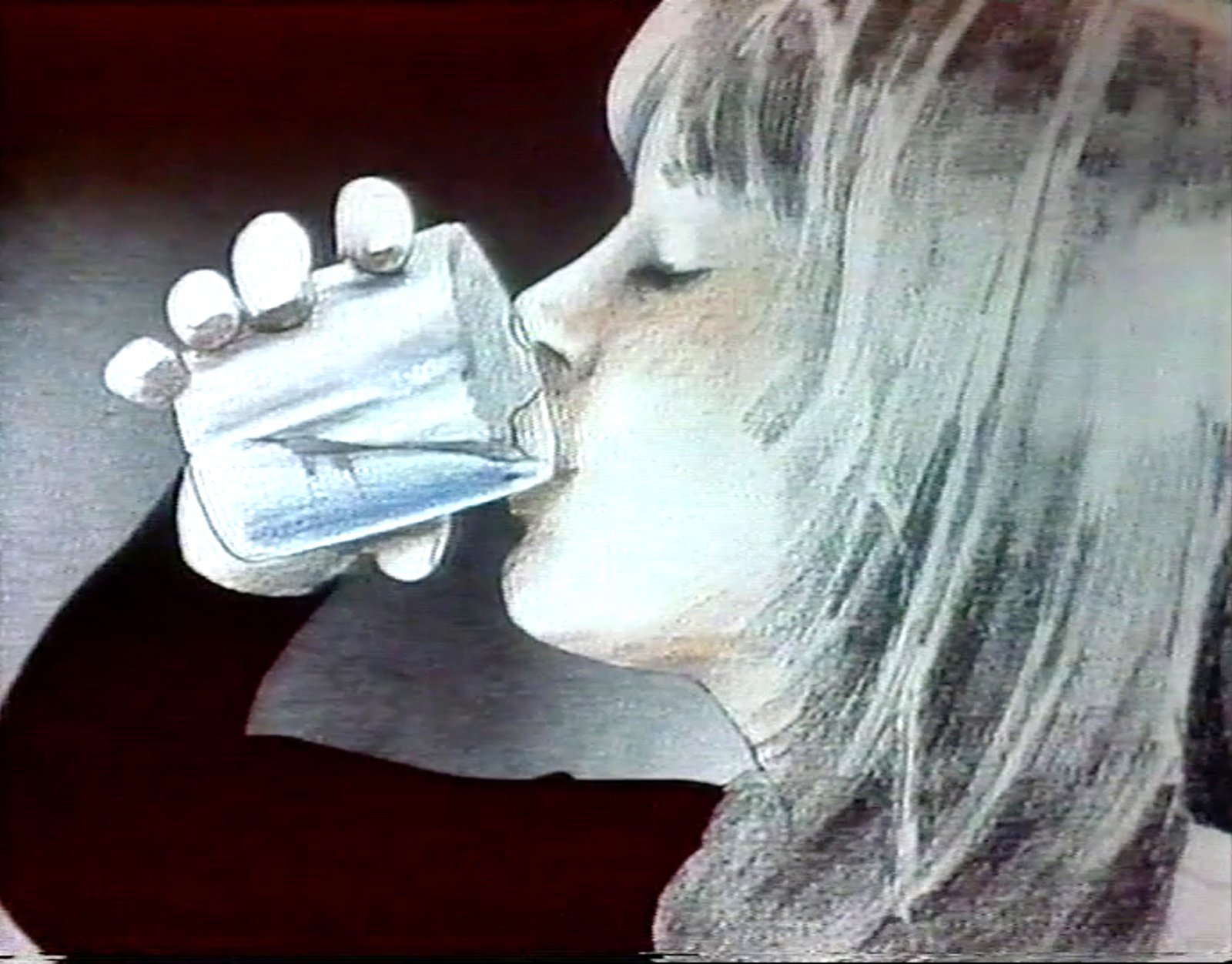 Still from Treo, a close view of a fair-haired woman drinking bubbling water from a glass