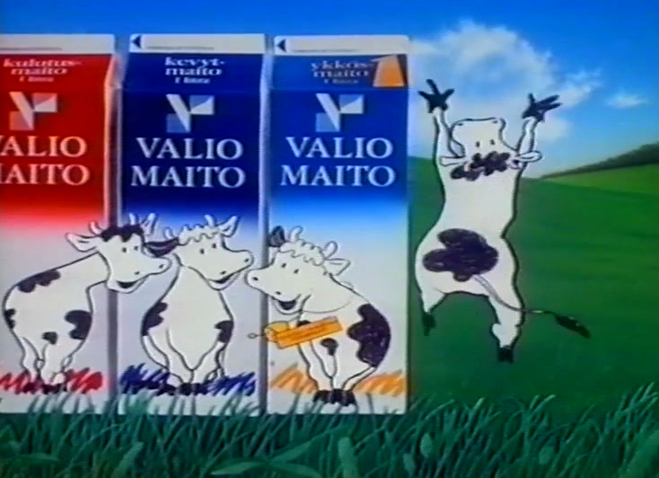 Four cartons across the frame, each with a drawn cow, one holding a small horn.