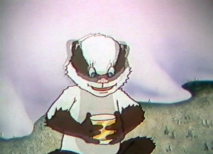 A white and brown badger raises a paw to its mouth, pot of pudding beside.