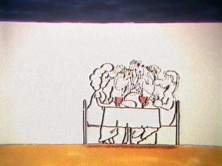 Two diners toast with red glasses as a covered dish is carried in behind them.