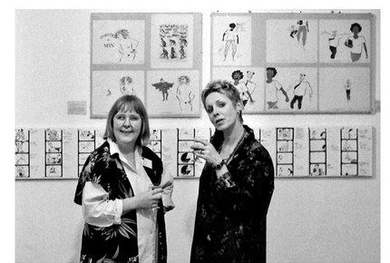 Marjut Rimminen and Christine Roche at the opening of Film & Strip, Kettle's Yard, with their drawings hung in a long horizontal grid behind them