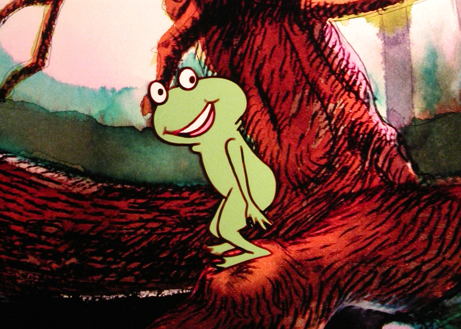 Still from The Frog King, a smiling green frog sits against a red-brown tree root