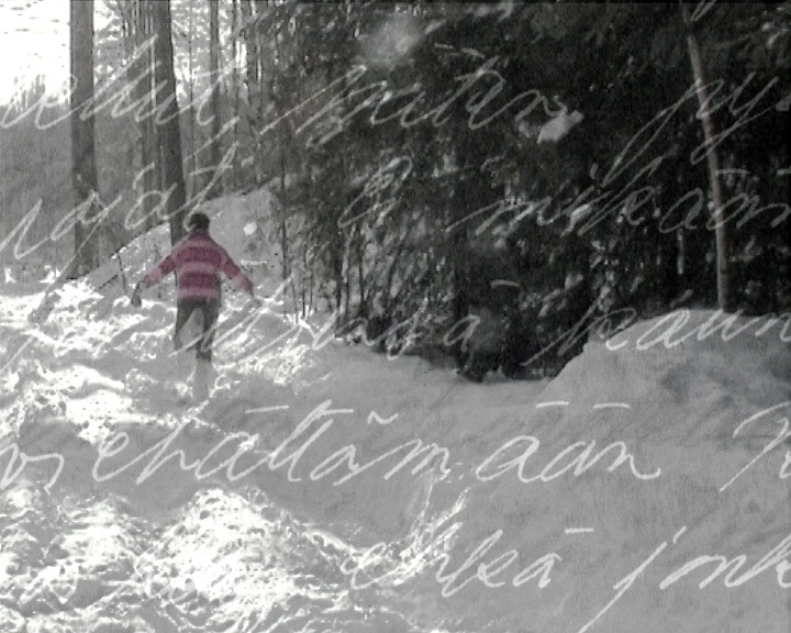 Still from Learned by Heart — figure walking in snow with handwritten text